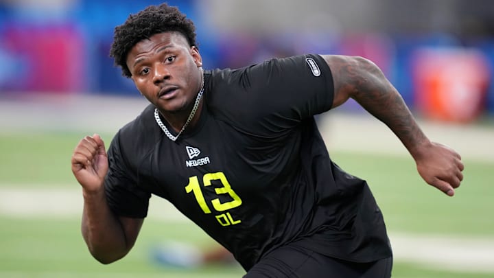 Feb 27, 2025; Indianapolis, IN, USA; Arkansas defensive lineman Eric Gregory (DL13) participates in drills during the 2025 NFL Combine at Lucas Oil Stadium. Mandatory Credit: Kirby Lee-Imagn Images
