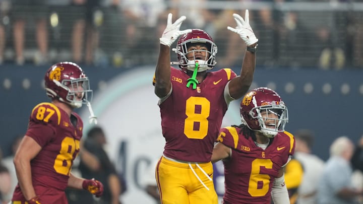 Sep 1, 2024; Paradise, Nevada, USA; Southern California Trojans wide receiver Ja'Kobi Lane (8) and wide receiver Makai Lemon (6 celebrate after a touchdown in the fourth quarter against the LSU Tigers at Allegiant Stadium. Mandatory Credit: Kirby Lee-Imagn Images