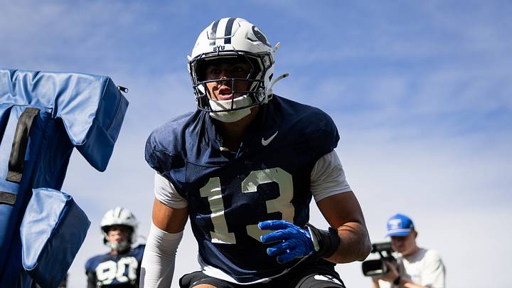 BYU defensive end Tausili Akana performs a drill during Spring Camp BYU defensive end Tausili Akana performs a drill during Spring Camp