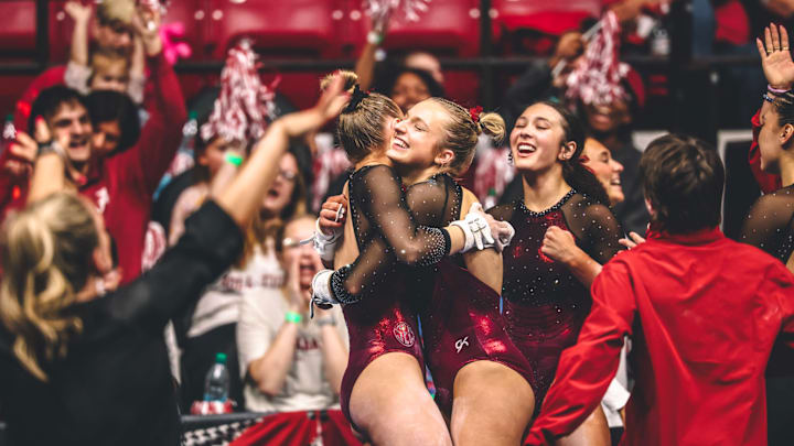 Alabama gymnasts celebrate a routine against Florida Alabama gymnasts celebrate a routine against Florida