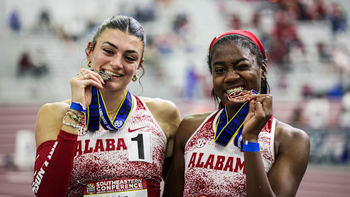 Katelyn Adel and  Miracle Ailes celebrate with their medals at the 2026 SEC Track and Field Indoor Championships