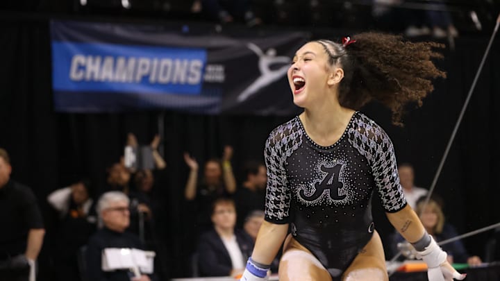 Alabama gymnast Paityn Walker celebrates after her uneven bars routine at NCAA Corvallis Regional