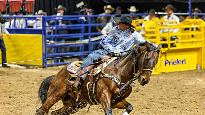 Tyler Wade aboard the 2024 AQHA Heading Horse of the Year, Espuela Bro Tyler Wade aboard the 2024 AQHA Heading Horse of the Year, Espuela Bro