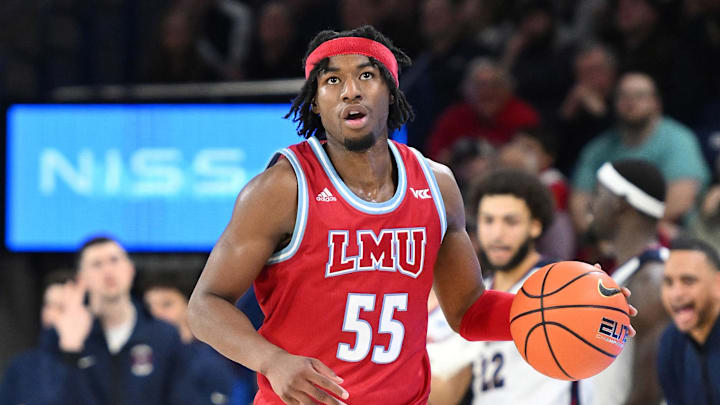 Jan 30, 2024; Spokane, Washington, USA; Loyola Marymount Lions guard Dominick Harris (55) controls the ball against the Gonzaga Bulldogs in the second half at McCarthey Athletic Center. Mandatory Credit: James Snook-Imagn Images