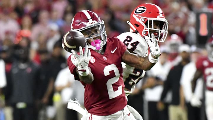 Sep 28, 2024; Tuscaloosa, Alabama, USA; Alabama Crimson Tide wide receiver Ryan Williams (2) makes a catch against Georgia Bulldogs defensive back Malaki Starks (24) at Bryant-Denny Stadium. Alabama defeated Georgia 41-34. Mandatory Credit: Gary Cosby Jr.-Imagn Images Sep 28, 2024; Tuscaloosa, Alabama, USA; Alabama Crimson Tide wide receiver Ryan Williams (2) makes a catch against Georgia Bulldogs defensive back Malaki Starks (24) at Bryant-Denny Stadium. Alabama defeated Georgia 41-34. Mandatory Credit: Gary Cosby Jr.-Imagn Images