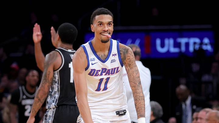 Mar 11, 2026; New York, NY, USA; DePaul Blue Demons guard CJ Gunn (11) celebrates his three point shot against the Georgetown Hoyas during the first half at Madison Square Garden. Mandatory Credit: Brad Penner-Imagn Images