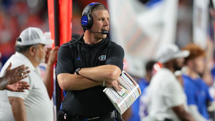 Sep 20, 2025; Miami Gardens, Florida, USA; Florida Gators head coach Billy Napier watches from the sideline against the Miami Hurricanes during the third quarter at Hard Rock Stadium. Mandatory Credit: Sam Navarro-Imagn Images