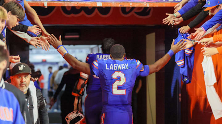 Florida quarterback DJ Lagway (2) leaves the field after beating Florida State 40-21 during an NCAA football game at Steve Spurrier Field at Ben Hill Griffin Stadium in Gainesville, FL on Saturday, November 29, Florida beat Florida State 40-21.2025. [Alan Youngblood/Gainesville Sun]