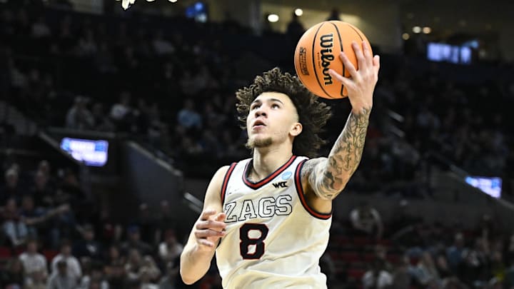 Mar 19, 2026; Portland, OR, USA; Gonzaga Bulldogs guard Jalen Warley (8) shoots against the Kennesaw State Owls during the second half of a first round game of the men's 2026 NCAA Tournament at Moda Center. Mar 19, 2026; Portland, OR, USA; Gonzaga Bulldogs guard Jalen Warley (8) shoots against the Kennesaw State Owls during the second half of a first round game of the men's 2026 NCAA Tournament at Moda Center.