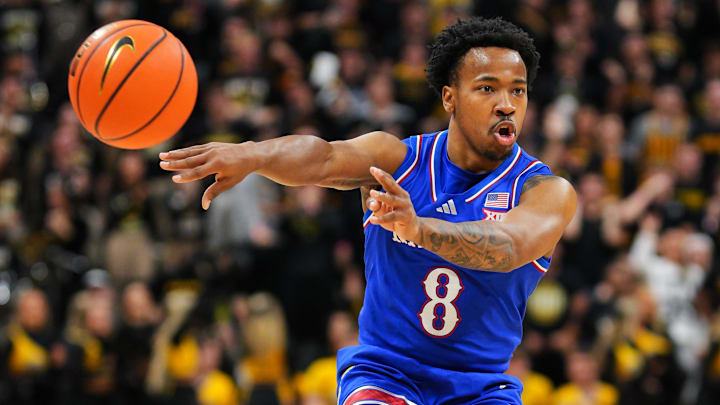 Dec 8, 2024; Columbia, Missouri, USA; Kansas Jayhawks guard David Coit (8) makes a pass during the first half against the Missouri Tigers at Mizzou Arena. Mandatory Credit: Jay Biggerstaff-Imagn Images Dec 8, 2024; Columbia, Missouri, USA; Kansas Jayhawks guard David Coit (8) makes a pass during the first half against the Missouri Tigers at Mizzou Arena. Mandatory Credit: Jay Biggerstaff-Imagn Images