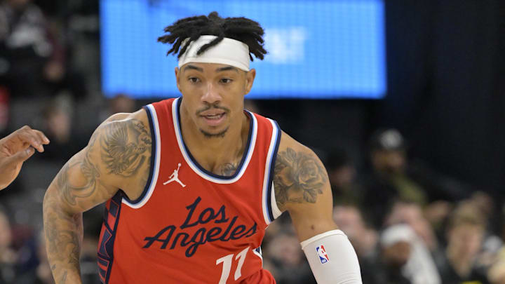 Dec 16, 2024; Inglewood, California, USA;    Los Angeles Clippers guard Jordan Miller (11) handles the ball in the second half against the Utah Jazz at Intuit Dome. Mandatory Credit: Jayne Kamin-Oncea-Imagn Images