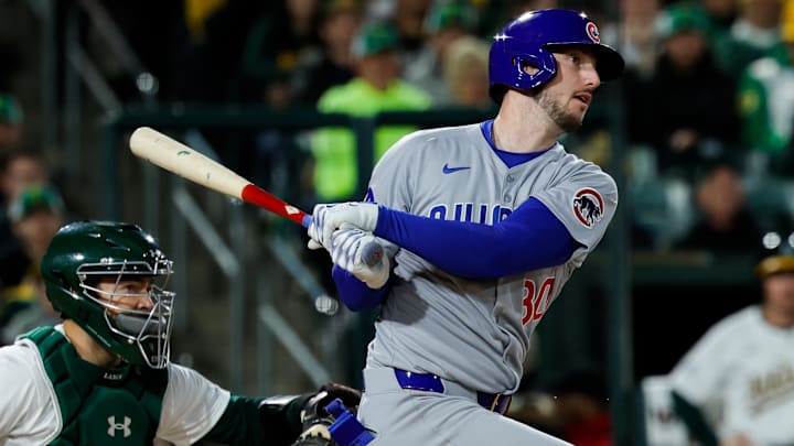 Mar 31, 2025; West Sacramento, California, USA; Chicago Cubs outfielder Kyle Tucker (30) hits a single during the fifth inning against the Athletics at Sutter Health Park.