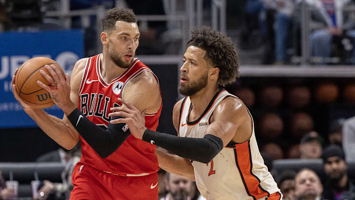 Nov 18, 2024; Detroit, Michigan, USA; Detroit Pistons guard Cade Cunningham (2) defends against Chicago Bulls guard Zach LaVine (8) during the first half at Little Caesars Arena. Mandatory Credit: David Reginek-Imagn Images