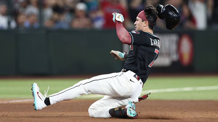 Aug 8, 2026; Phoenix, Arizona, USA; Arizona Diamondbacks right fielder Corbin Carroll (7) slides after hitting an RBI triple against the Los Angeles Dodgers in the ninth inning at Chase Field. Mandatory Credit: Anna Carrington-Imagn Images Aug 8, 2026; Phoenix, Arizona, USA; Arizona Diamondbacks right fielder Corbin Carroll (7) slides after hitting an RBI triple against the Los Angeles Dodgers in the ninth inning at Chase Field. Mandatory Credit: Anna Carrington-Imagn Images