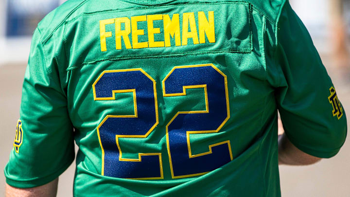 A fan wears a Freeman    22 jersey before the Notre Dame vs. California NCAA football game Saturday,