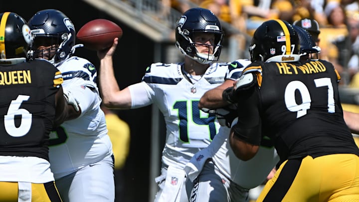 Sep 14, 2025; Pittsburgh, Pennsylvania, USA; Seattle Seahawks quarterback Sam Darnold (14) throws a pass while being pressured by Pittsburgh Steelers defensive tackle Cameron Heyward (97) during the first quarter at Acrisure Stadium. Mandatory Credit: Barry Reeger-Imagn Images Sep 14, 2025; Pittsburgh, Pennsylvania, USA; Seattle Seahawks quarterback Sam Darnold (14) throws a pass while being pressured by Pittsburgh Steelers defensive tackle Cameron Heyward (97) during the first quarter at Acrisure Stadium. Mandatory Credit: Barry Reeger-Imagn Images