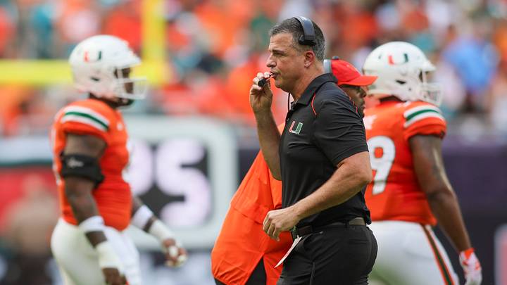 Sep 9, 2023; Miami Gardens, Florida, USA; Miami Hurricanes head coach Mario Cristobal looks on against the Texas A&M Aggies during the first quarter at Hard Rock Stadium. Mandatory Credit: Sam Navarro-USA TODAY Sports