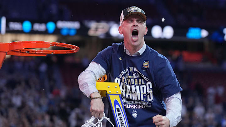 Apr 8, 2024; Glendale, AZ, USA; Connecticut Huskies head coach Dan Hurley celebrates after cutting down the net after defeating the Purdue Boilermakers in the national championship game of the Final Four of the 2024 NCAA Tournament at State Farm Stadium. Mandatory Credit: Robert Deutsch-Imagn Images Apr 8, 2024; Glendale, AZ, USA; Connecticut Huskies head coach Dan Hurley celebrates after cutting down the net after defeating the Purdue Boilermakers in the national championship game of the Final Four of the 2024 NCAA Tournament at State Farm Stadium. Mandatory Credit: Robert Deutsch-Imagn Images