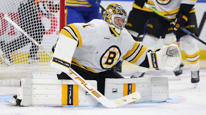 Apr 21, 2026; Buffalo, New York, USA; Boston Bruins goaltender Jeremy Swayman (1) looks top make a save during the second period against the Buffalo Sabres in game two of the first round of the 2026 Stanley Cup Playoffs at KeyBank Center. Mandatory Credit: Timothy T. Ludwig-Imagn Images