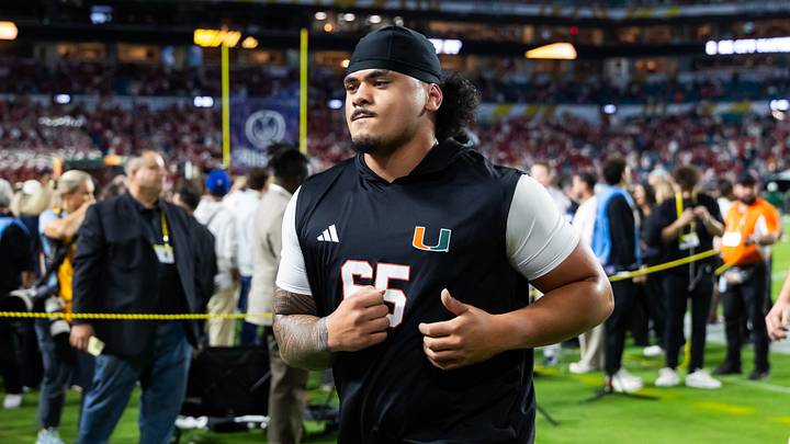 Jan 19, 2026; Miami Gardens, FL, USA; Miami Hurricanes offensive lineman Seuseu Alofaituli (65) against the Indiana Hoosiers during the College Football Playoff National Championship game at Hard Rock Stadium. Mandatory Credit: Mark J. Rebilas-Imagn Images Jan 19, 2026; Miami Gardens, FL, USA; Miami Hurricanes offensive lineman Seuseu Alofaituli (65) against the Indiana Hoosiers during the College Football Playoff National Championship game at Hard Rock Stadium. Mandatory Credit: Mark J. Rebilas-Imagn Images