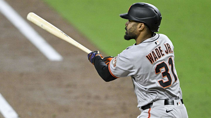 Apr 29, 2025; San Diego, California, USA; San Francisco Giants first baseman LaMonte Wade Jr. (31) hits an RBI triple during the sixth inning against the San Diego Padres at Petco Park.