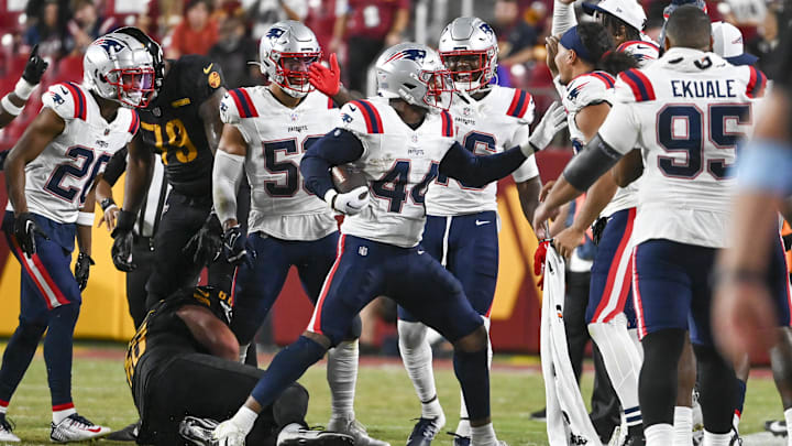 Aug 25, 2024; Landover, Maryland, USA; New England Patriots linebacker Joe Giles-Harris (44) celebrates with teammates after intercepting a pass during the first half against the Washington Commanders at Commanders Field. Mandatory Credit: Tommy Gilligan-Imagn Images Aug 25, 2024; Landover, Maryland, USA; New England Patriots linebacker Joe Giles-Harris (44) celebrates with teammates after intercepting a pass during the first half against the Washington Commanders at Commanders Field. Mandatory Credit: Tommy Gilligan-Imagn Images