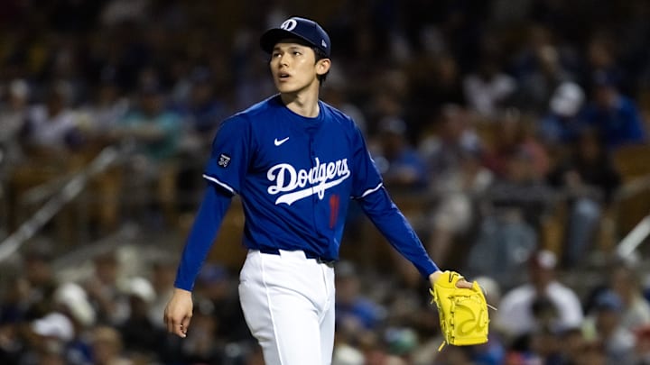 Mar 4, 2025; Phoenix, Arizona, USA; Los Angeles Dodgers pitcher Roki Sasaki against the Cincinnati Reds during a spring training game at Camelback Ranch-Glendale. Mandatory Credit: Mark J. Rebilas-Imagn Images