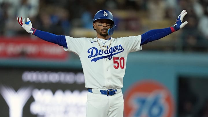 Mar 30, 2026; Los Angeles, California, USA; Los Angeles Dodgers shortstop Mookie Betts (50) celebrates after hitting a double against the Cleveland Guardians in the ninth inning at Dodger Stadium. Mandatory Credit: Kirby Lee-Imagn Images