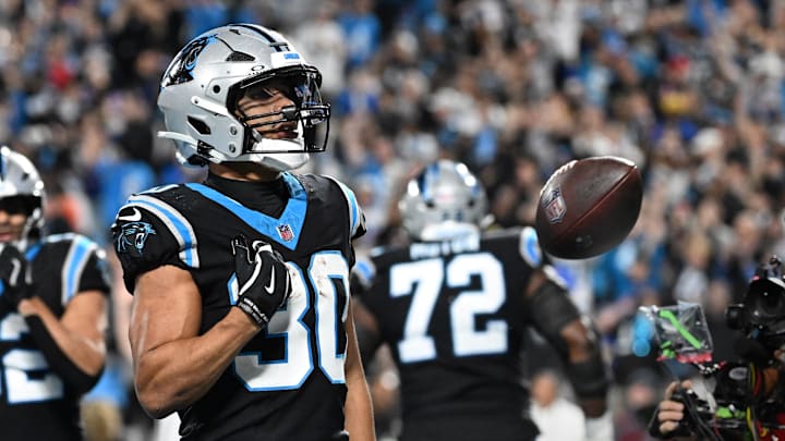 Jan 10, 2026; Charlotte, NC, USA; Carolina Panthers running back Chuba Hubbard (30) reacts after scoring a touchdown in the fourth quarter in an NFC Wild Card Round game at Bank of America Stadium. Mandatory Credit: Bob Donnan-Imagn Images Jan 10, 2026; Charlotte, NC, USA; Carolina Panthers running back Chuba Hubbard (30) reacts after scoring a touchdown in the fourth quarter in an NFC Wild Card Round game at Bank of America Stadium. Mandatory Credit: Bob Donnan-Imagn Images