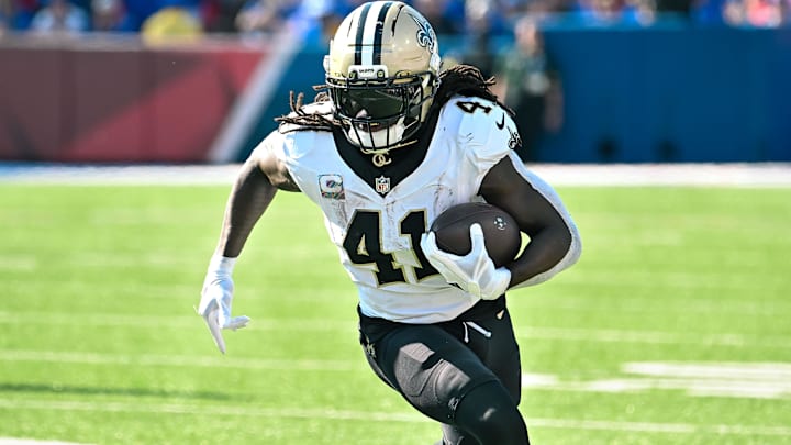 Sep 28, 2025; Orchard Park, New York, USA; New Orleans Saints running back Alvin Kamara (41) carries the ball against the Buffalo Bills in the third quarter at Highmark Stadium. Mandatory Credit: Mark Konezny-Imagn Images