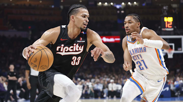 Nov 20, 2024; Oklahoma City, Oklahoma, USA; Portland Trail Blazers forward Toumani Camara (33) drives to the basket against Oklahoma City Thunder guard Aaron Wiggins (21) during the first quarter at Paycom Center. Mandatory Credit: Alonzo Adams-Imagn Images Nov 20, 2024; Oklahoma City, Oklahoma, USA; Portland Trail Blazers forward Toumani Camara (33) drives to the basket against Oklahoma City Thunder guard Aaron Wiggins (21) during the first quarter at Paycom Center. Mandatory Credit: Alonzo Adams-Imagn Images
