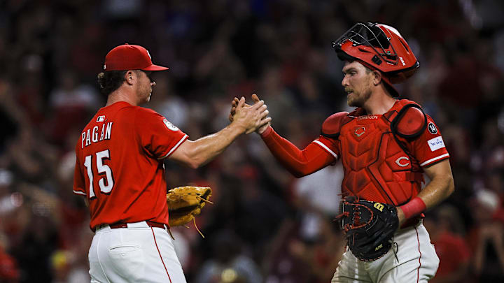 Jun 17, 2025; Cincinnati, Ohio, USA; Cincinnati Reds relief pitcher Emilio Pagan (15) shakes hands with catcher Tyler Stephenson (37) after the victory over the Minnesota Twins at Great American Ball Park. Mandatory Credit: Katie Stratman-Imagn Images Jun 17, 2025; Cincinnati, Ohio, USA; Cincinnati Reds relief pitcher Emilio Pagan (15) shakes hands with catcher Tyler Stephenson (37) after the victory over the Minnesota Twins at Great American Ball Park. Mandatory Credit: Katie Stratman-Imagn Images