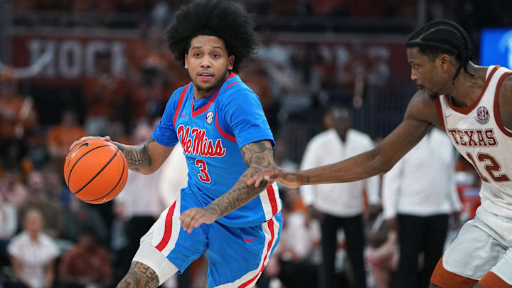 Feb 7, 2026; Austin, Texas, USA; Mississippi Rebels guard Koren Johnson (3) drives the ball against Texas Longhorns guard Tramon Mark (12) during the second half at Moody Center. Mandatory Credit: Dustin Safranek-Imagn Images