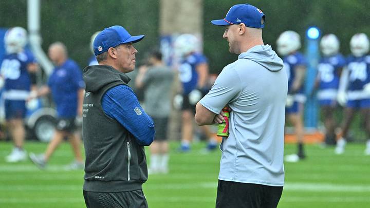 Buffalo Bills head coach Joe Brady (right) speaks with general manager Brandon Beane during training camp at St. John Fisher University. Mandatory Credit: Mark Konezny-Imagn Images Buffalo Bills head coach Joe Brady (right) speaks with general manager Brandon Beane during training camp at St. John Fisher University. Mandatory Credit: Mark Konezny-Imagn Images