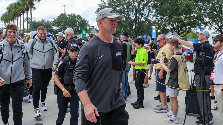 Sep 20, 2025; Orlando, Florida, USA; UCF Knights head coach Scott Frost walks into the venue before the game against the North Carolina Tar Heels at the Bounce House Stadium. Mandatory Credit: Mike Watters-Imagn Images Sep 20, 2025; Orlando, Florida, USA; UCF Knights head coach Scott Frost walks into the venue before the game against the North Carolina Tar Heels at the Bounce House Stadium. Mandatory Credit: Mike Watters-Imagn Images