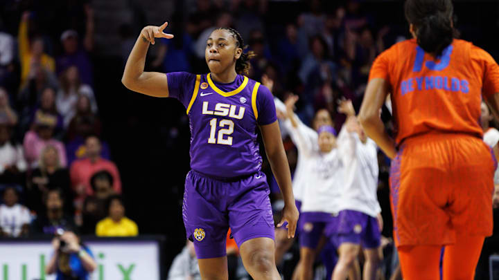 Jan 19, 2025; Gainesville, Florida, USA; LSU Tigers guard Mikaylah Williams (12) gestures after making a three-point basket against the Florida Gators during the first half at Exactech Arena at the Stephen C. O'Connell Center. Mandatory Credit: Matt Pendleton-Imagn Images