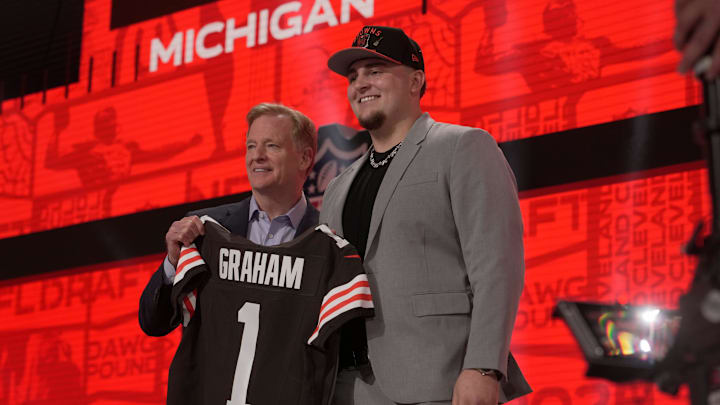 Mason Graham, DT, Michigan poses with NFL Commissioner Roger Goodell after being selected 5th overall by the Cleveland Browns during the first round of the 2025 NFL Draft at Lambeau Field on April 24, 2025 in Green Bay, Wisconsin. Mason Graham, DT, Michigan poses with NFL Commissioner Roger Goodell after being selected 5th overall by the Cleveland Browns during the first round of the 2025 NFL Draft at Lambeau Field on April 24, 2025 in Green Bay, Wisconsin.