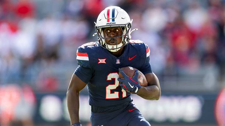 Nov 22, 2025; Tucson, Arizona, USA; Arizona Wildcats running back Ismail Mahdi (21) against the Baylor Bears at Casino Del Sol Stadium. Nov 22, 2025; Tucson, Arizona, USA; Arizona Wildcats running back Ismail Mahdi (21) against the Baylor Bears at Casino Del Sol Stadium.