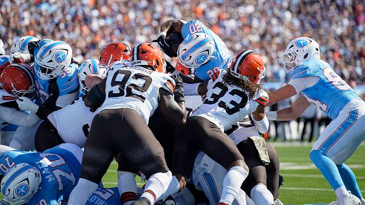 Tennessee Titans running back Tony Pollard (20) can’t climb over the Cleveland Browns defense and was short for the touchdown during the second quarter at Nissan Stadium in Nashville, Tenn., Sunday, Oct. 25, 2026. Tennessee Titans running back Tony Pollard (20) can’t climb over the Cleveland Browns defense and was short for the touchdown during the second quarter at Nissan Stadium in Nashville, Tenn., Sunday, Oct. 25, 2026.