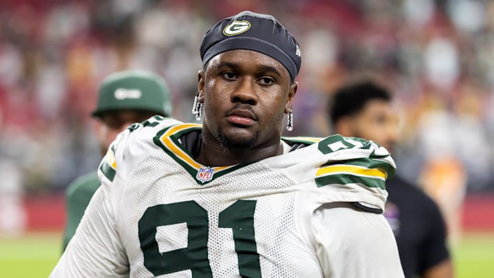 Oct 19, 2025; Glendale, Arizona, USA; Green Bay Packers defensive lineman Warren Brinson (91) against the Arizona Cardinals at State Farm Stadium. Mandatory Credit: Mark J. Rebilas-Imagn Images