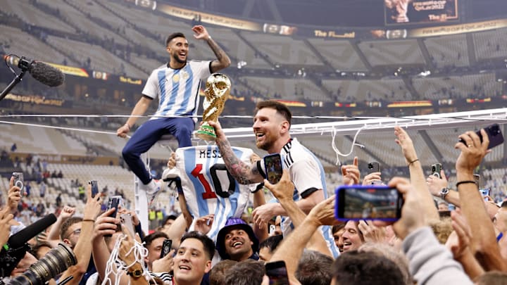 Dec 18, 2022; Lusail, Qatar; Argentina forward Lionel Messi (10) celebrates with fans after winning the 2022 World Cup final against France at Lusail Stadium. Mandatory Credit: Yukihito Taguchi-Imagn Images Dec 18, 2022; Lusail, Qatar; Argentina forward Lionel Messi (10) celebrates with fans after winning the 2022 World Cup final against France at Lusail Stadium. Mandatory Credit: Yukihito Taguchi-Imagn Images