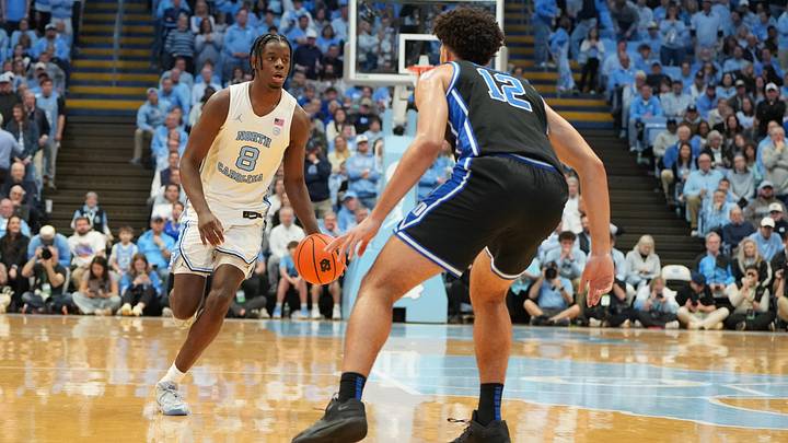 Feb 7, 2026; Chapel Hill, North Carolina, USA; North Carolina Tar Heels forward Caleb Wilson (8) with the ball as Duke Blue Devils forward Cameron Boozer (12) defends in the second half at Dean E. Smith Center. Mandatory Credit: Bob Donnan-Imagn Images Feb 7, 2026; Chapel Hill, North Carolina, USA; North Carolina Tar Heels forward Caleb Wilson (8) with the ball as Duke Blue Devils forward Cameron Boozer (12) defends in the second half at Dean E. Smith Center. Mandatory Credit: Bob Donnan-Imagn Images