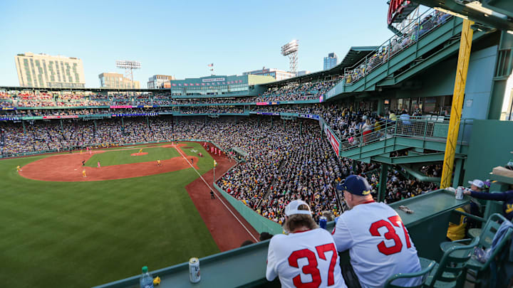 Saturday, June 8, 2024; Boston MA-Fans watch the game from the top of the Green Monster during the Savannah Bananas first Banana Ball game at Fenway Park on Saturday, June 8, 2024.