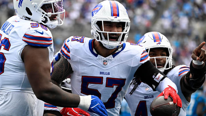Oct 26, 2025; Charlotte, North Carolina, USA; Buffalo Bills defensive end AJ Epenesa (57) celebrates with guard Connor McGovern (66) and linebacker Dorian Williams (42) after intercepting a pass in the second quarter against the Carolina Panthers at Bank of America Stadium. Oct 26, 2025; Charlotte, North Carolina, USA; Buffalo Bills defensive end AJ Epenesa (57) celebrates with guard Connor McGovern (66) and linebacker Dorian Williams (42) after intercepting a pass in the second quarter against the Carolina Panthers at Bank of America Stadium.