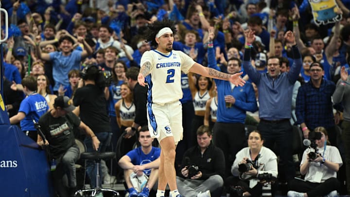 Dec 4, 2024; Omaha, Nebraska, USA; Creighton Bluejays guard Pop Isaacs (2) reacts to the crowd after making a three point basket against the Kansas Jayhawks during the second half at CHI Health Center Omaha. Mandatory Credit: Steven Branscombe-Imagn Images