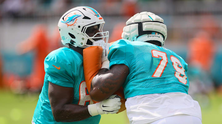 Aug 6, 2024; Miami Gardens, FL, USA; Miami Dolphins guard Matthew Jones (62) works out with offensive tackle Bayron Matos (79) during a joint practice with the Atlanta Falcons at Baptist Health Training Complex. Aug 6, 2024; Miami Gardens, FL, USA; Miami Dolphins guard Matthew Jones (62) works out with offensive tackle Bayron Matos (79) during a joint practice with the Atlanta Falcons at Baptist Health Training Complex.
