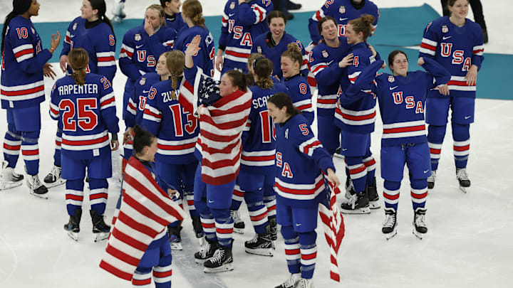 Feb 19, 2026; Milan, Italy; Team USA celebrates winning the gold medal in women’s ice hockey against Canada in overtime during the Milano Cortina 2026 Olympic Winter Games at Milano Santagiulia Ice Hockey Arena. Mandatory Credit: Geoff Burke-Imagn Images Feb 19, 2026; Milan, Italy; Team USA celebrates winning the gold medal in women’s ice hockey against Canada in overtime during the Milano Cortina 2026 Olympic Winter Games at Milano Santagiulia Ice Hockey Arena. Mandatory Credit: Geoff Burke-Imagn Images