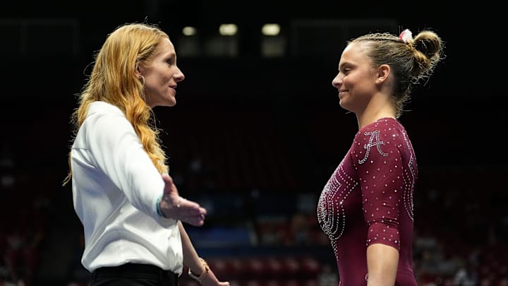 Apr 4, 2025; Tuscaloosa, AL, USA; Alabama head coach Ashley Johnston talks to Lilly Hudson before she competes on the floor at Coleman Coliseum during the NCAA Tuscaloosa Gymanstics Regional. 