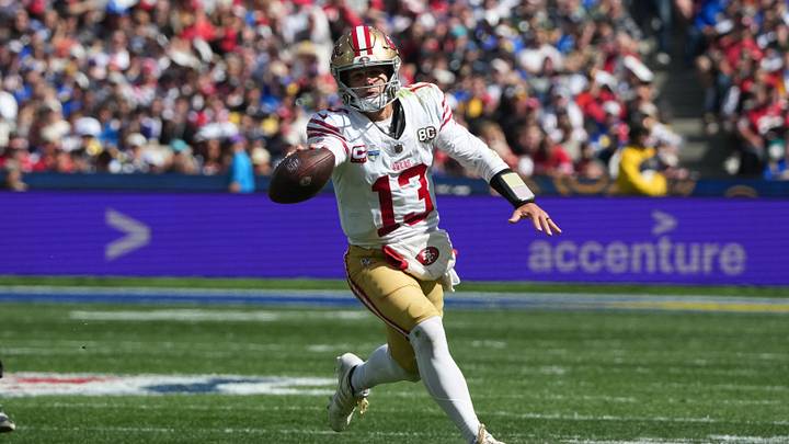 Sep 11, 2026; Melbourne, Victoria, Australia; San Francisco 49ers quarterback Brock Purdy (13) runs with the ball in the second half against the Los Angeles Rams during the 2026 NFL Melbourne Game at Melbourne Cricket Ground. Mandatory Credit: Kirby Lee-Imagn Images Sep 11, 2026; Melbourne, Victoria, Australia; San Francisco 49ers quarterback Brock Purdy (13) runs with the ball in the second half against the Los Angeles Rams during the 2026 NFL Melbourne Game at Melbourne Cricket Ground. Mandatory Credit: Kirby Lee-Imagn Images