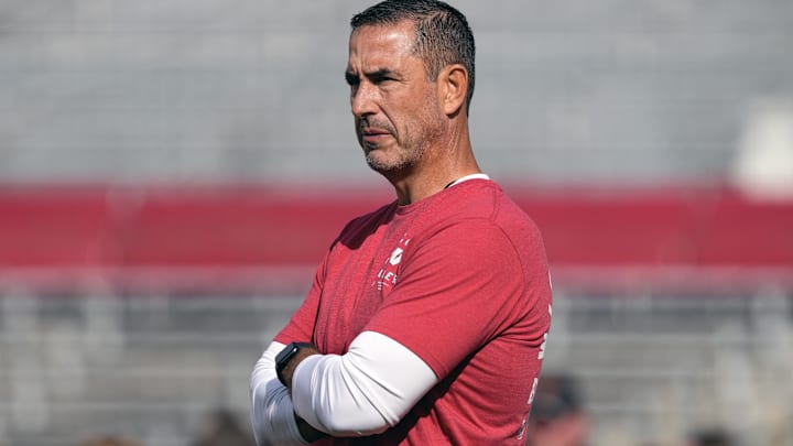 Sep 20, 2025; Madison, Wisconsin, USA;  Wisconsin Badgers head coach Luke Fickell looks on during warm-ups prior to the game against the Maryland Terrapins at Camp Randall Stadium. Mandatory Credit: Jeff Hanisch-Imagn Images